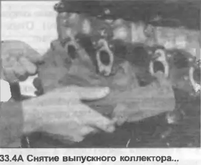4. Открутите монтажные гайки и достаньте выпускной коллектор с головки блока цилиндров. Снимите…