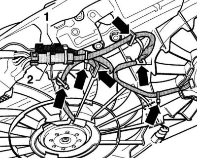 4. Disconnect connectors (1) and (2). Move aside the electric wires of the fan motor.