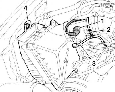 4. Odspojite konektor (1).