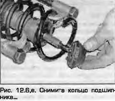 6. Uklonite čahuru (ako je predviđeno), prsten ležaja, donja podloška i prsten. Skinite graničnik s…