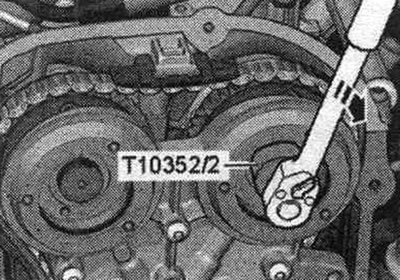 Remove the front support panel. Remove the upper timing chain cover. The control valves have…