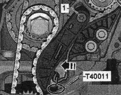 Press down the oil drive chain tensioner. pump in the «direction of the arrow» and lock with the…