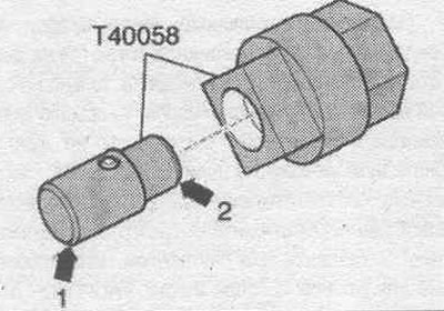 Поставете водещите щифтове на адаптера «T40058», както е показано по-долу: големият диаметър…