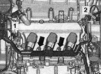 1. Ventil 1 nastavenia fázy časovania «N205». 2. Hallov snímač «G40».