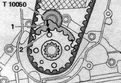 Lock the crankshaft toothed belt sprocket with the crankshaft stopper «T10050». The marks on the…