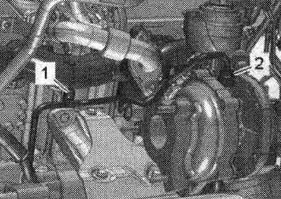 Поставете обратно филтъра за твърди частици на дизела. «Поз. 1, 2» не се вземат предвид. Развийте…