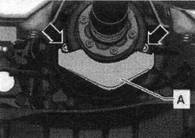 If present, unscrew the «arrow» bolts and remove the heat shield of the propeller shaft «A».