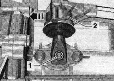 Engage 6th gear by removing shift shaft «1» and shifting gear lever «2» forward in the «direction…