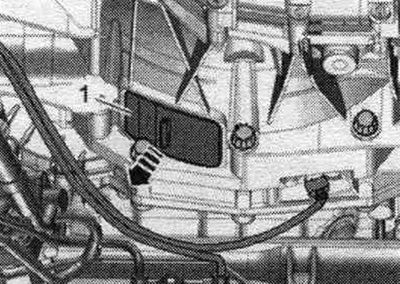 Remove cover «1» under the gearbox «arrow».