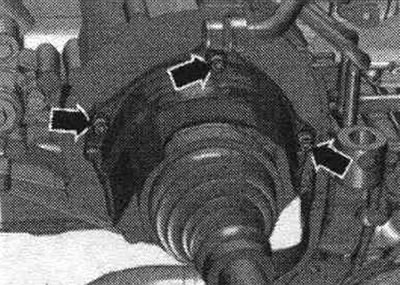 Unscrew the arrow bolts and remove the heat shield of the right drive shaft. For better…