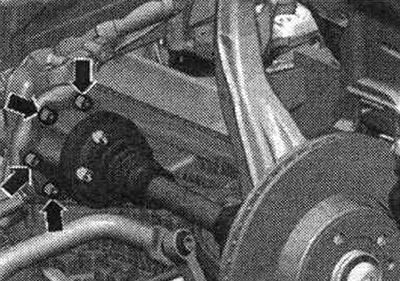 Unscrew the left and right drive shafts from the shafts with the gearbox flange.