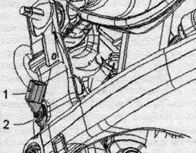 Remove the rear speed sensor «1». To do this, unscrew bolt «2». Remove the drive shafts inward.