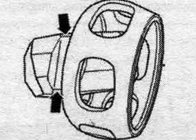Remove the cage from the separator using the ball recesses «arrows».