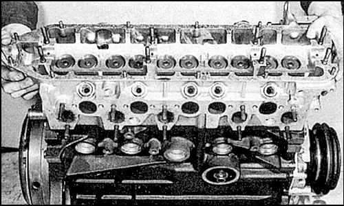 16. Remove the head bolts in the reverse order of tightening (see Fig. Cylinder Head Bolt…