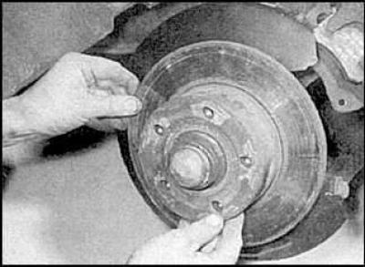 1. Loosen the mounting bolts and remove the brake caliper.