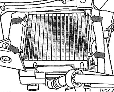 6.11. Unscrew the bolts (see arrows) fastening the transmission fluid cooling radiator to the rear…