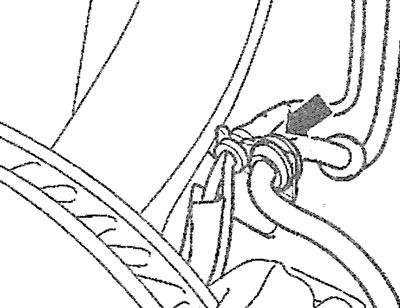 3.4. Release the brake hose from the holder (see arrow)