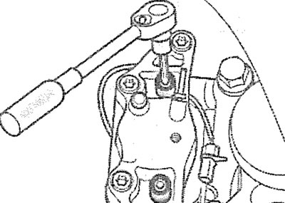 3.6. Unscrew both guide pins with a socket wrench