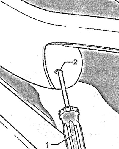 11.1. Insert a thin screwdriver 1, holding it at an angle, into the hole 2 on the door handle