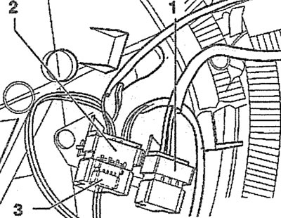 11.8. Remove from the holders and disconnect the plugs on the back of the door trim: