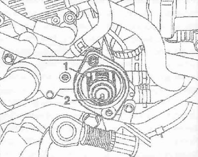 Плъзнете термостата във водача, както е показано на фигурата. Поставете зърното. Водещият щифт на…