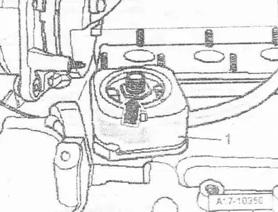Unscrew the nut «arrow» and remove the oil radiator «1».