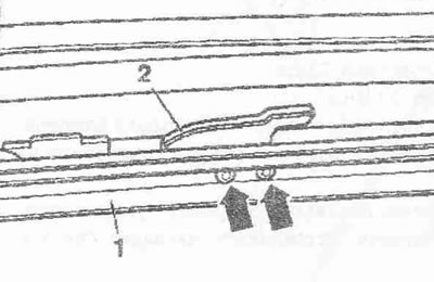 Detach the protective frame in the area of the bolts. To remove the locking hook, unscrew the bolts…