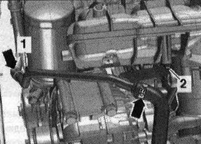 Адкруціць ніты «1» і «2» і пакласці трубку ОЖ з падлучанымі шлангамі ОЖ «стрэлкі» зверху.