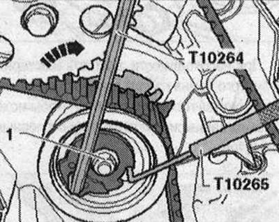 Разхлабете гайката «1» на опъващата ролка и отстранете фиксатора «T10265». «Стрелка» не трябва да…