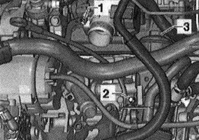 Odskrutkujte skrutku «1».