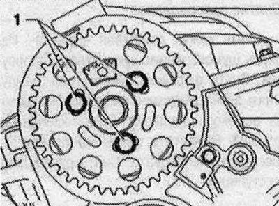 Odskrutkujte skrutky «1» a vyberte ozubené koleso rozvodového remeňa vačkového hriadeľa.