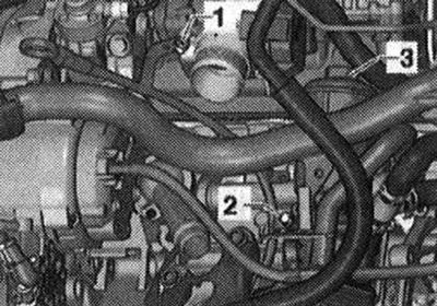 Развийте болтовете «1» и «2». Развийте капака «3» и извадете елемента на масления филтър.