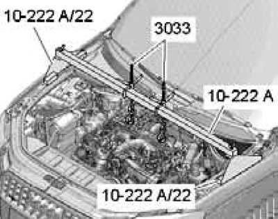 26.8. Hooking the devices onto the rear lifting eyes.