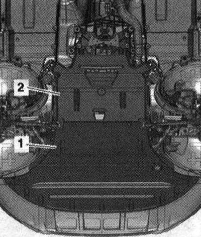 Odstráňte protihlukové clony «1» a «2». Odstráňte výfukové potrubie. Odstráňte pravé predné koleso.