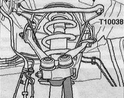 Ak je tam snímač svetlej výšky, odstráňte ho. Pripevnite puzdro ložiska náboja vľavo a vpravo…