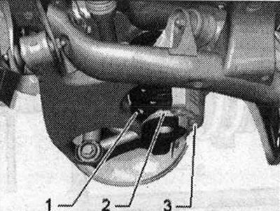 Завъртете спиралната пружина «1», докато спре в опората на пружината «2».