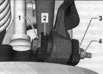 Зняць датчык колькасці абарачэнняў ззаду «1». Для гэтага выкруціць ніт «2». Зняць шрубавую спружыну.