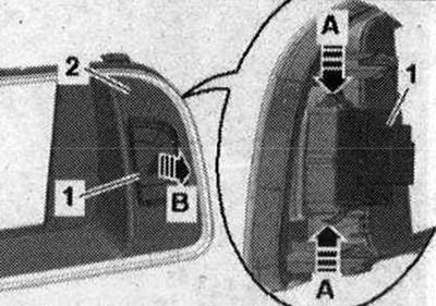 Odblokujte svorky «šípka A» a stlačte tlačidlo výstražných svetiel -E229 «POS. 1» z krytu «2»…